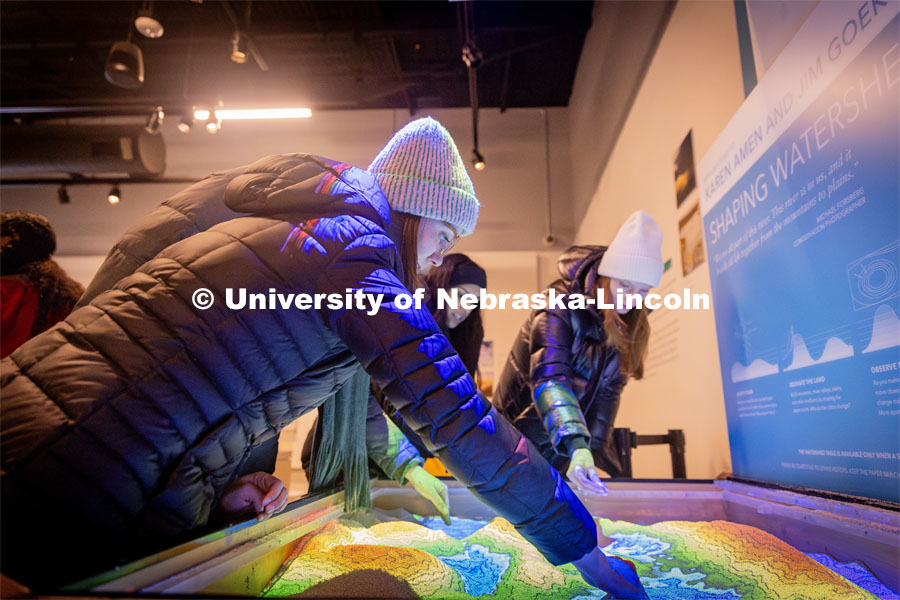 Museum guests play with an interactive exhibit. Morrill Hall and state museum for About Lincoln website. January 17, 2024. Photo by Kristen Labadie / University Communication.